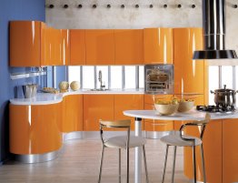 Купить Кухня с оранжевыми радиусными фасадами в каталоге Из пвх