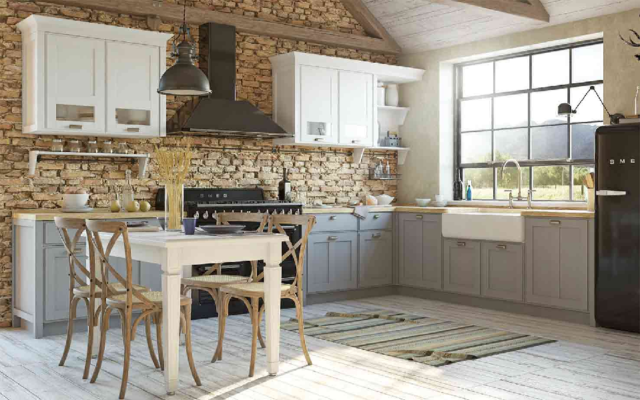 Угловая кухня с фартуком из камня