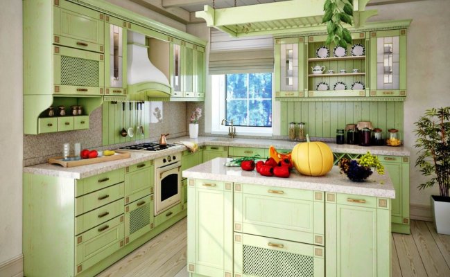 Угловая кухня с островом в фисташковом цвете